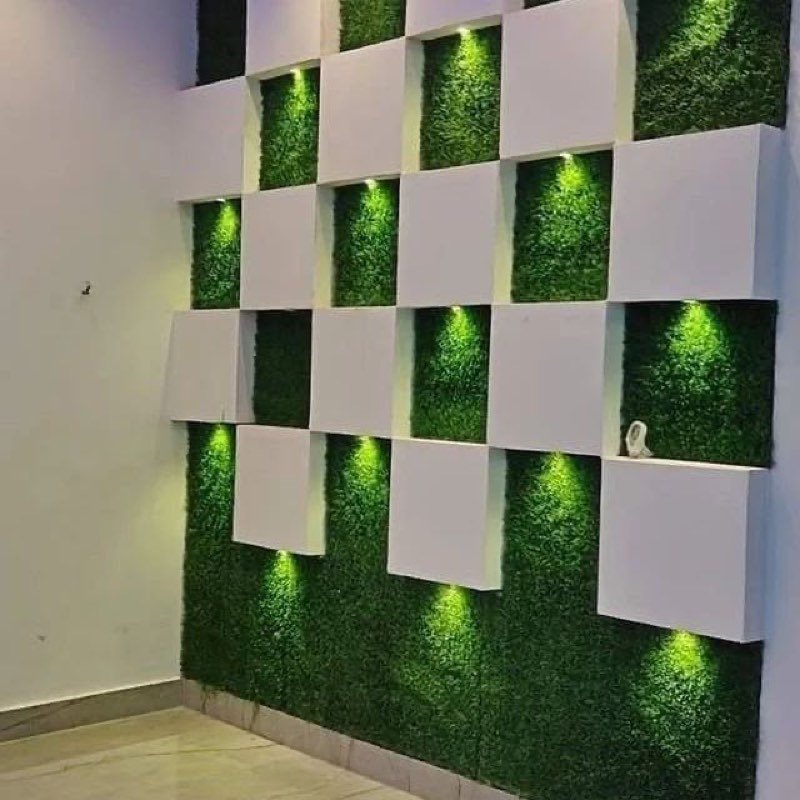 Moss wall panels with accent lighting